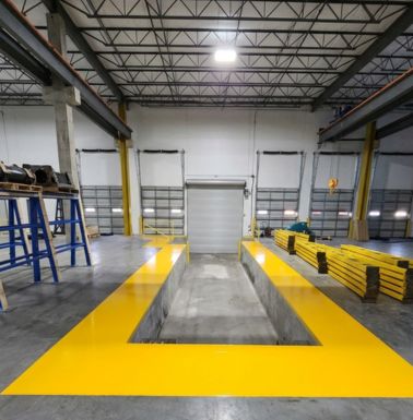 iIndustrial floor coating and safety markings in commercial warehouse remodeling in Houston TX